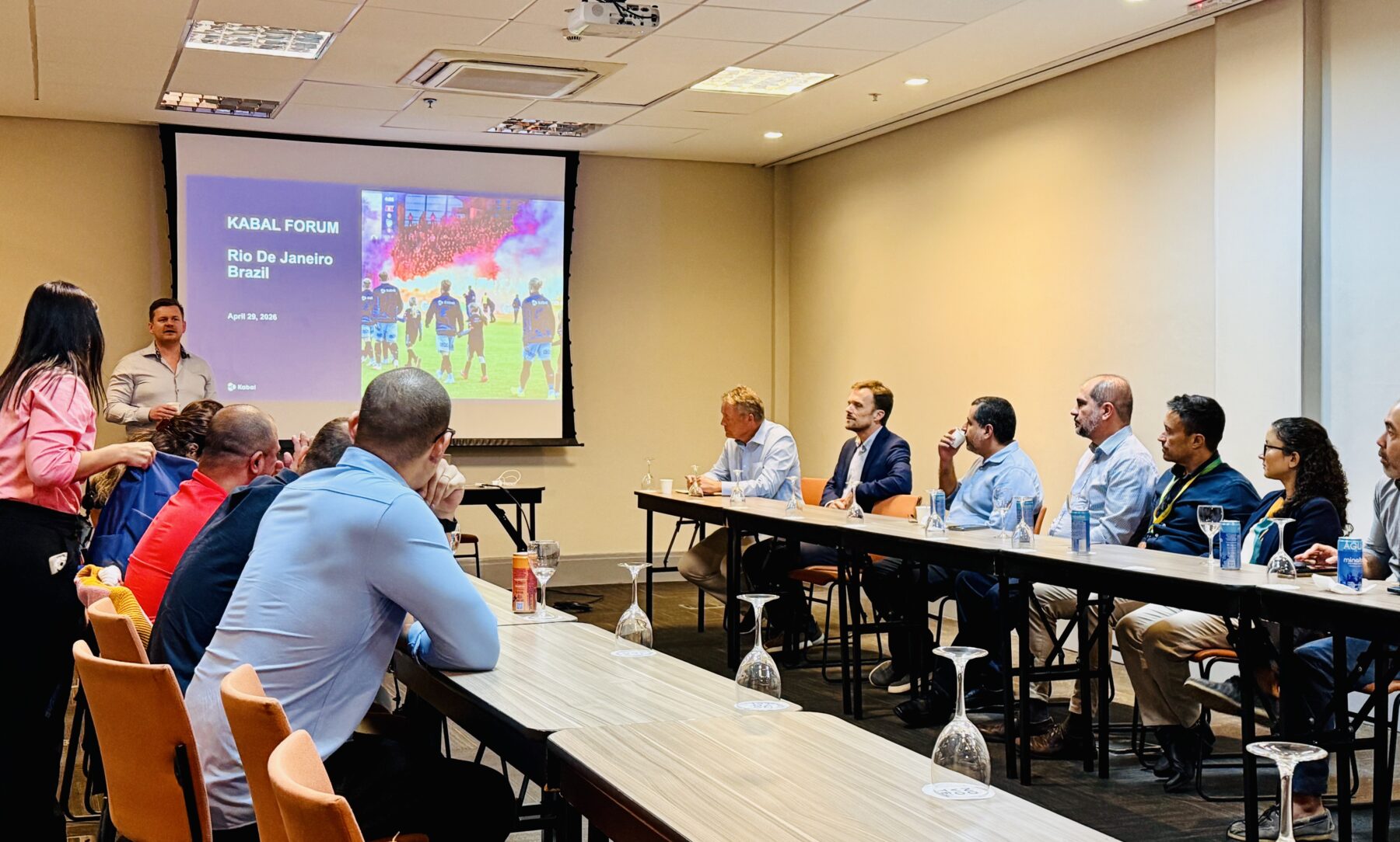 People sitting in a meeting room listening to a presenter at Kabal Forum Brazil